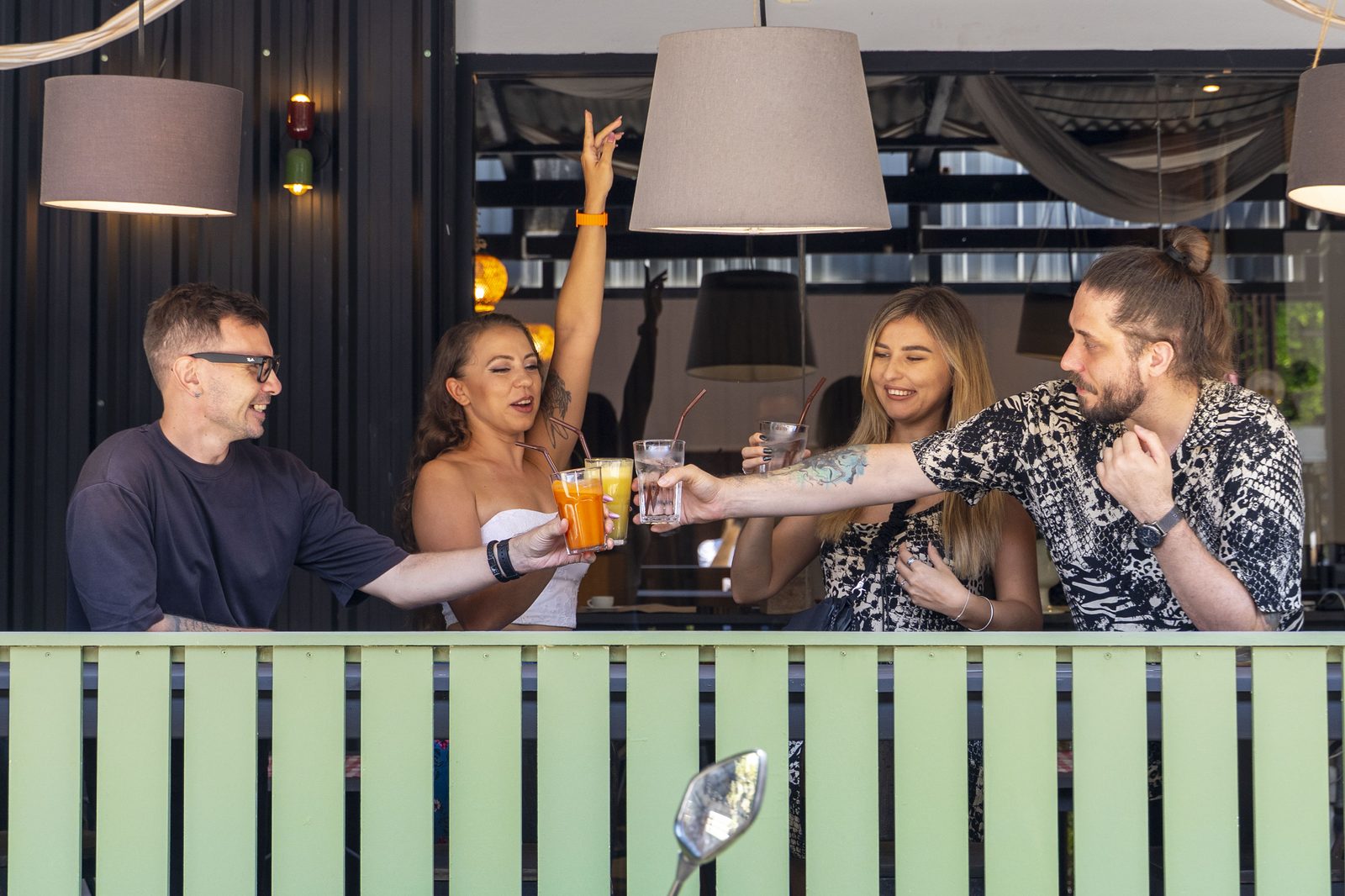Guests enjoying drinks at LEO & LILY
